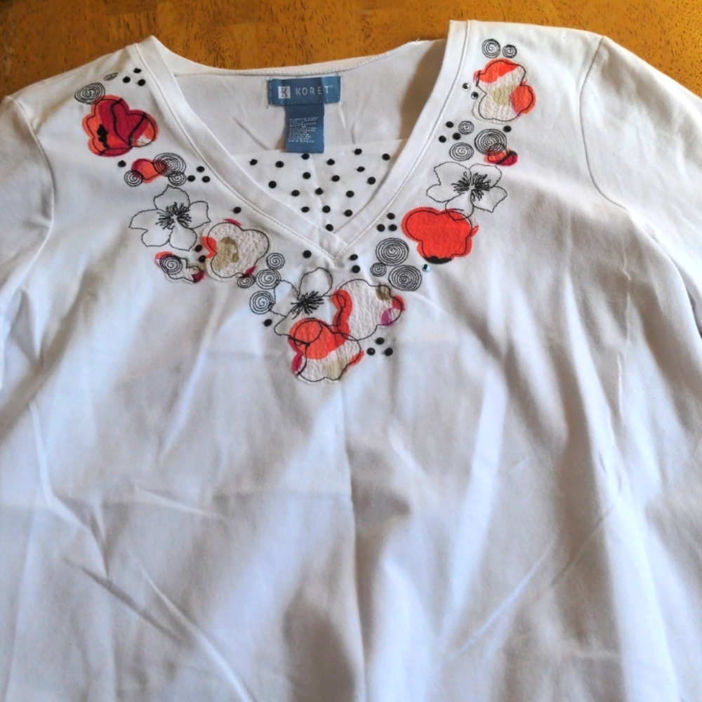 Floral trimmed top